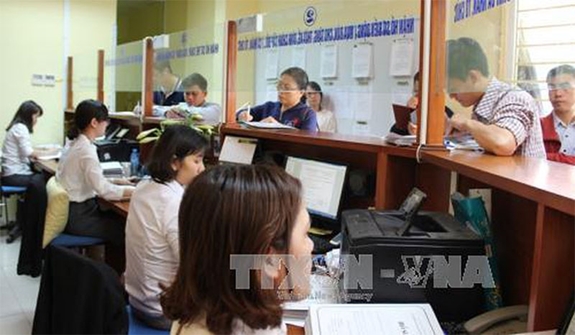 Cán bộ tiếp công dân không chỉ đòi hỏi phẩm chất, năng lực tốt mà cần có kinh nghiệm để giải quyết vấn đề một cách "có lý, có tình", nhằm tháo gỡ khó khăn, giảm búc xúc của công dân. Ảnh: TTXVN
